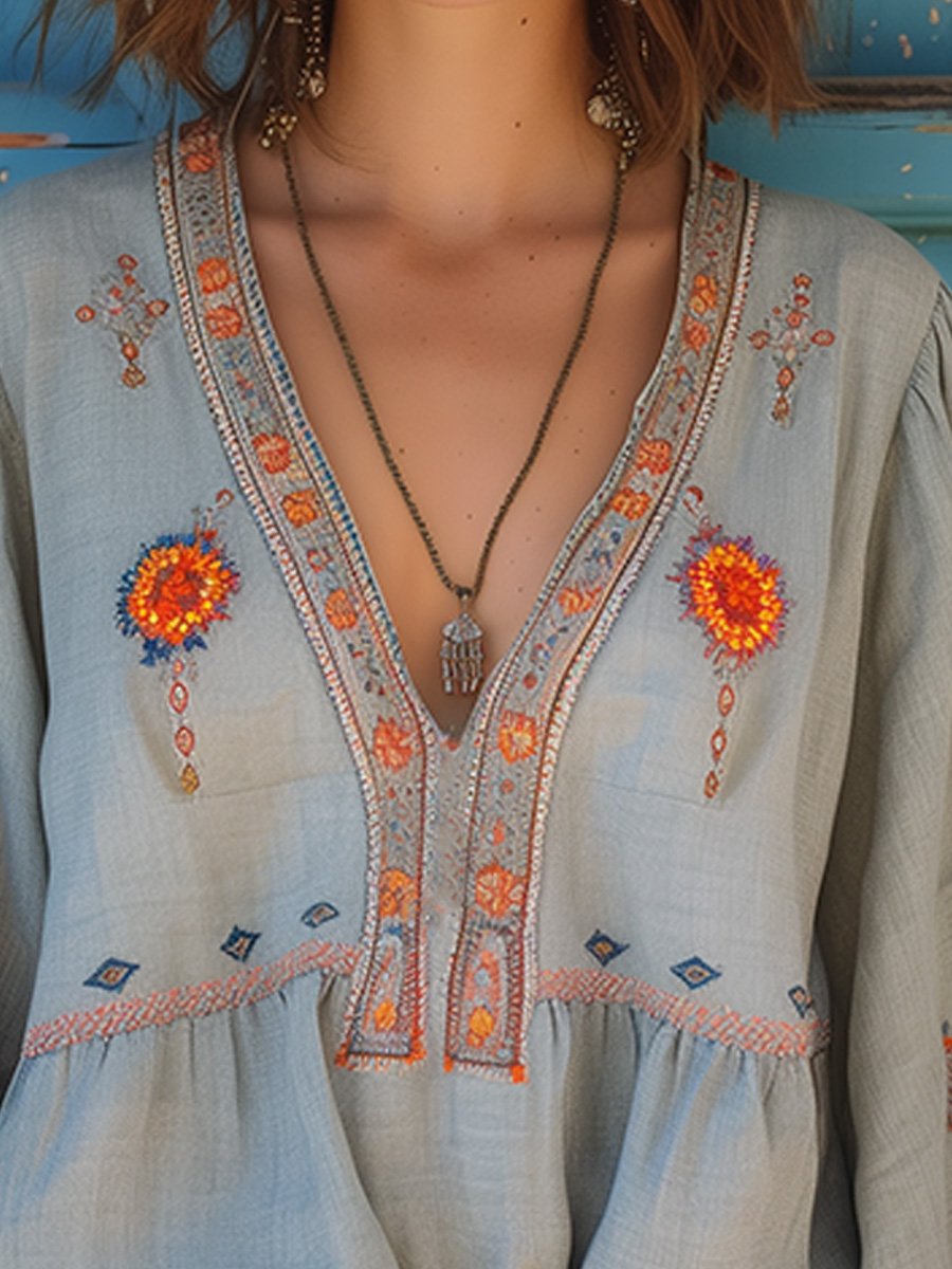 Sophie | Witte Dames Blouse Korte Mouw met V-hals en Geborduurde Accenten 1