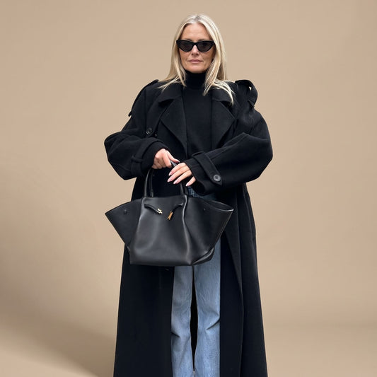 Zwarte dubbelrijse trenchcoat met ceintuur voor dames
