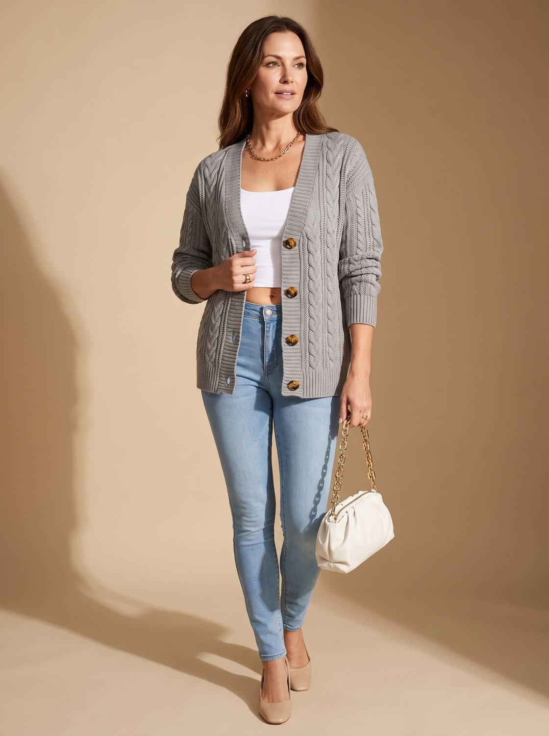 Dames vest met kabelpatroon en knoopsluiting, rondehals model