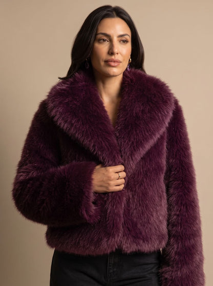FAUXELLA jas gedragen over een jurk voor avondlook