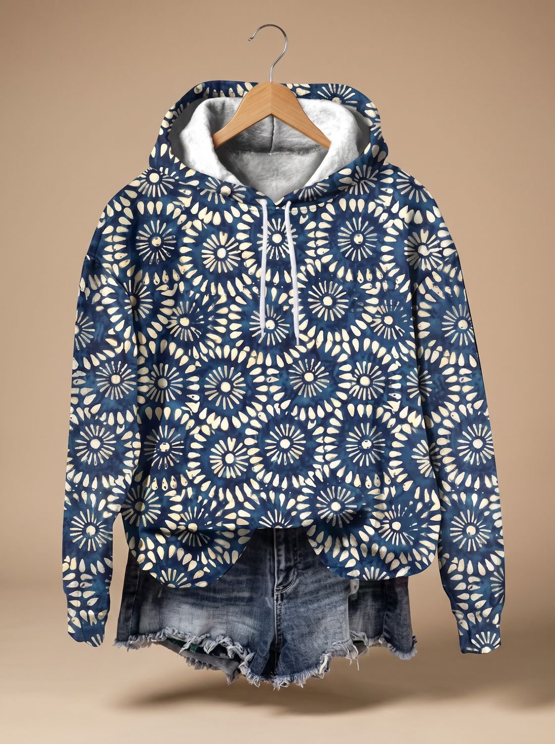 Detail van het kleurrijke bloemenpatroon op de FLORABEL hoodie