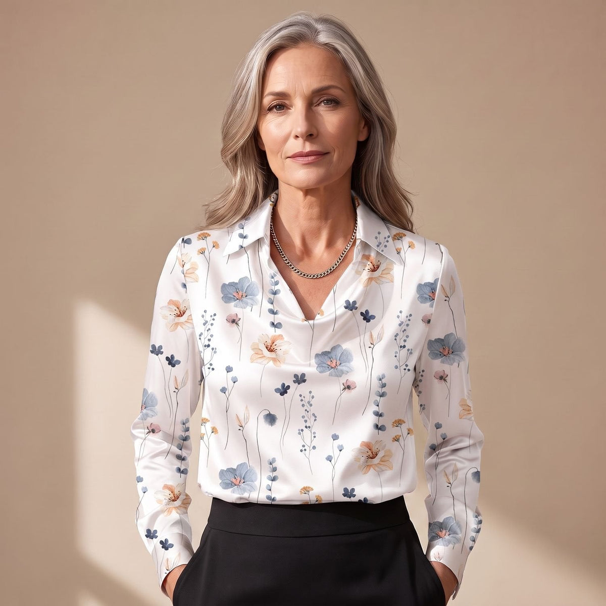 Satijnen blouse in verschillende kleuren weergegeven
