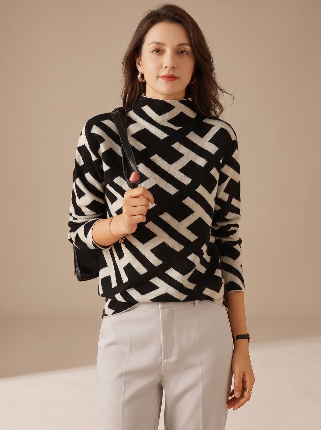 Detailfoto van het geometrische patroon op de pullover
