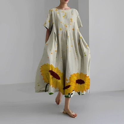 Zijaanzicht van zwierige midi-jurk met bloemenprint
