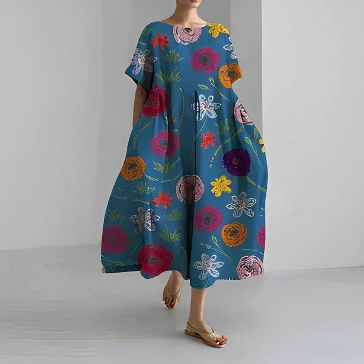 Achteraanzicht van losse midi-jurk met bloemenprint