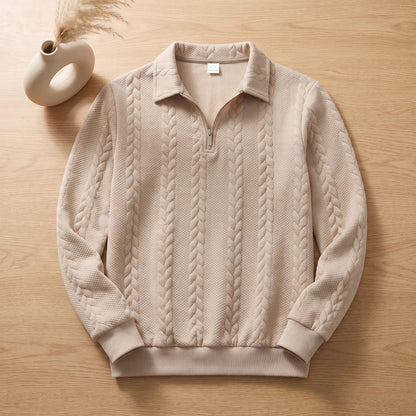 Close-up van het kabelpatroon op de TOBIAS heren pullover