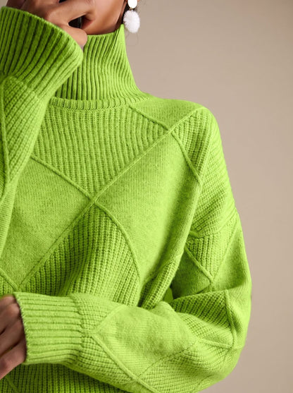 Herfstlook met coltrui als warme laag onder jas